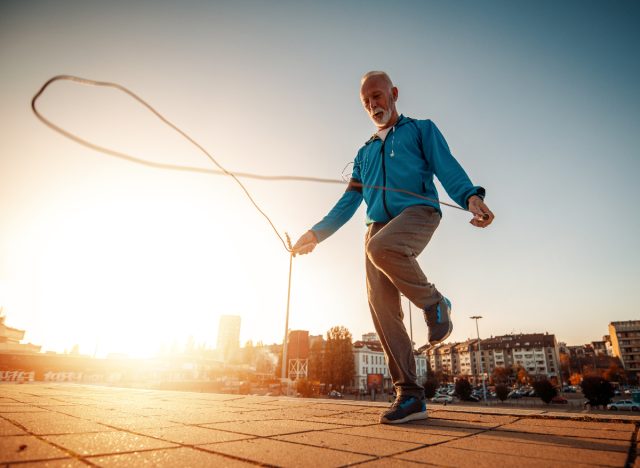 mature man jumping rope demonstrating working out seven days a week