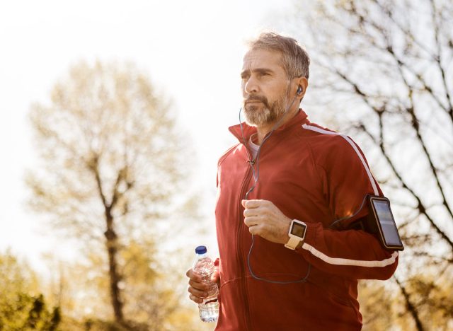 mature man running outdoors, demonstrating fitness habits that are rapidly aging your body
