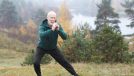 mature man doing side lunges, demonstrating exercise habits to slow muscle aging