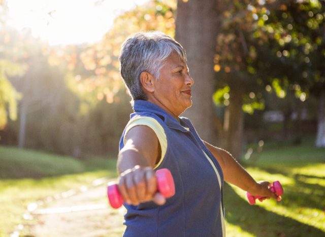 mature woman dumbbell lifts exercises