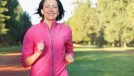 mature woman running cardio outdoors