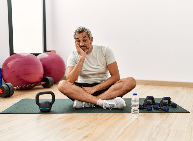 middle-aged man feeling frustrated and let down during workout