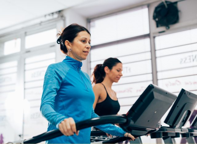middle-aged woman on treadmill demonstrating mistakes that sabotage your weight loss