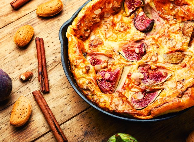 omelet with figs and almonds next to cinnamon sticks