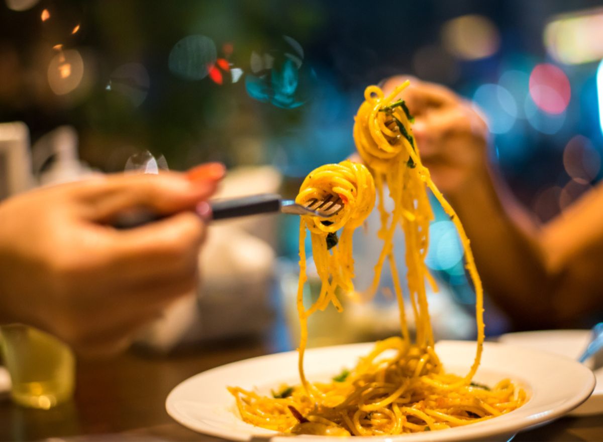 people eating pasta