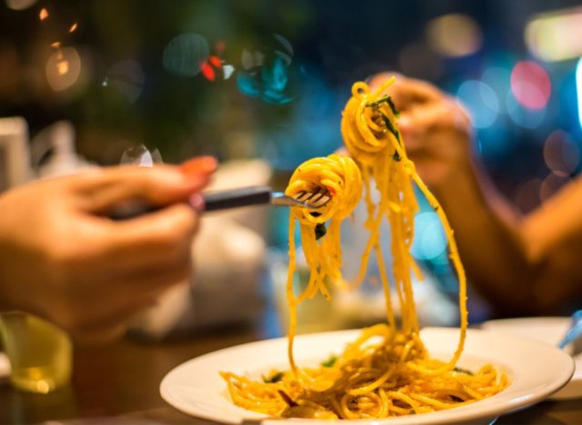 people eating pasta