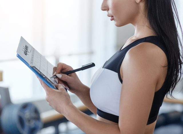 woman planning workout schedule