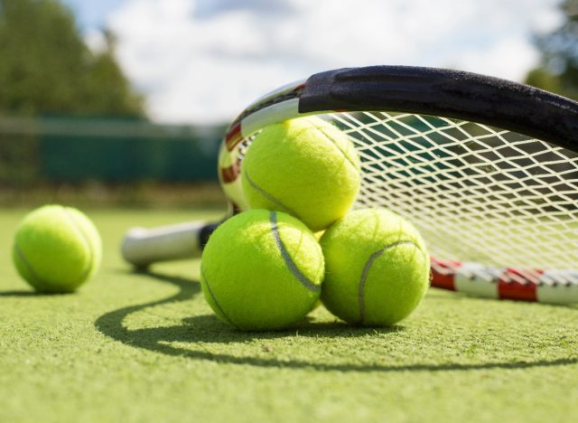 tennis racket and balls