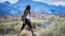 woman hiking demonstrating little-known habits to shrink your leg fat