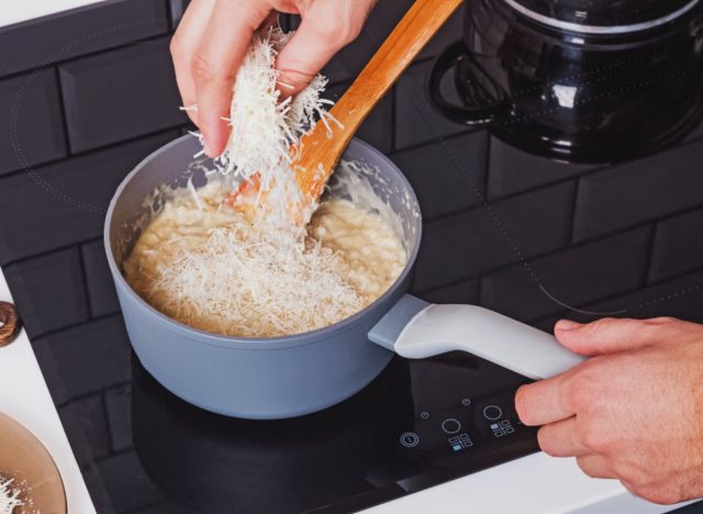 adding parmesan