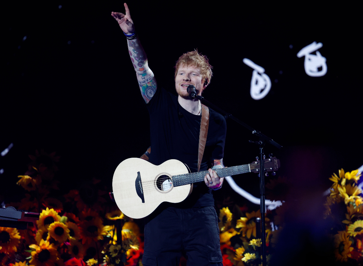 Ed Sheeran performing on stage