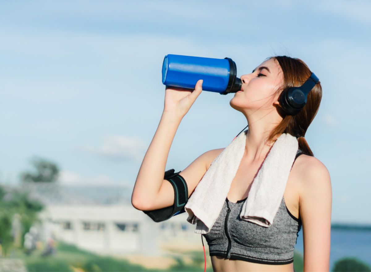 Lean person drinking drink