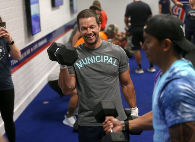 Mark Wahlberg lifting weights at opening of F45 Training at Miramar MCAs