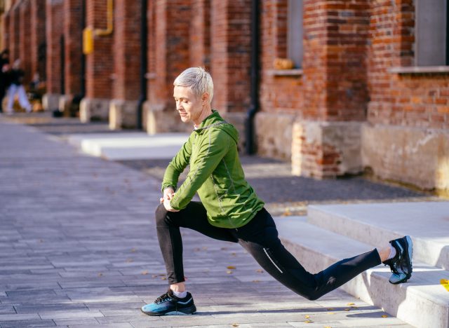 mature woman lunge exercise outdoors, speed up weight loss as you age