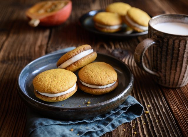 pumpkin sandwich cookies and milk