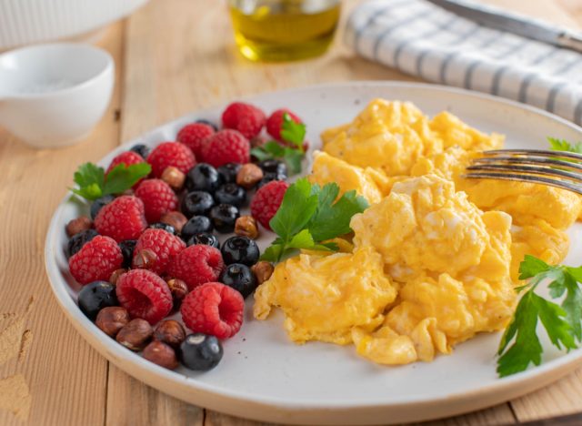 scrambled eggs, berries, and nuts