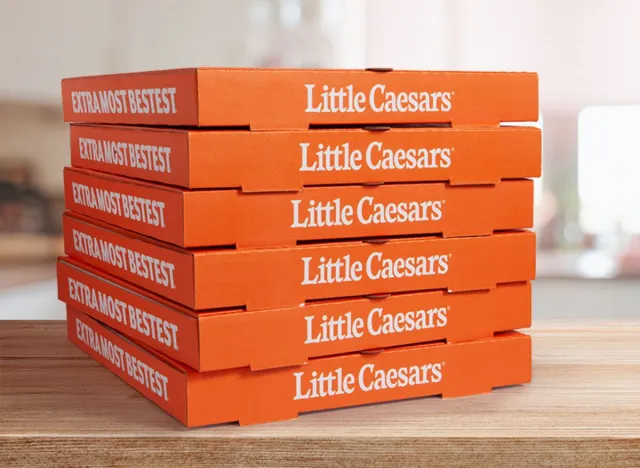 stack of little caesars pizza