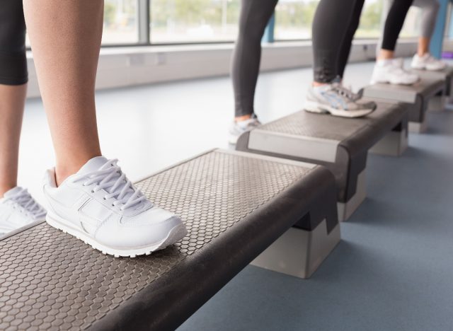 woman performing step-up exercises to improve muscular endurance