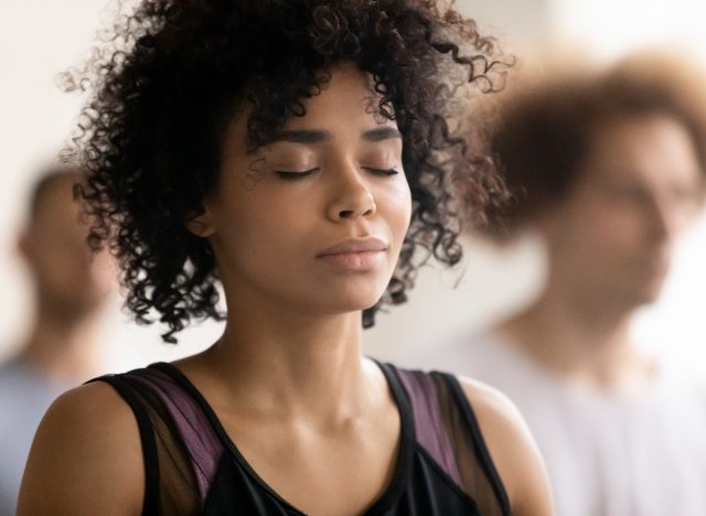 woman practicing 360 breathing during workout