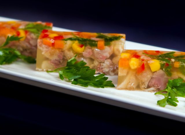aspic cubes with boiled meat, carrots, and corn