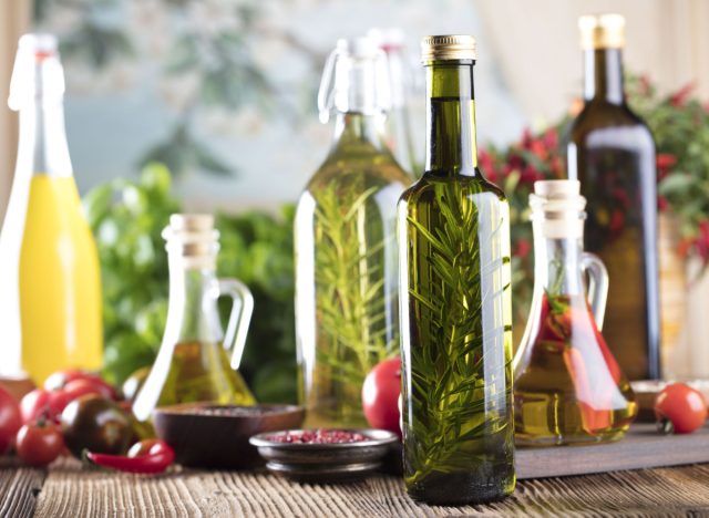 bottle of olive oil with rosemary