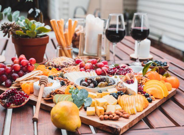 cheese board with fruit and nuts