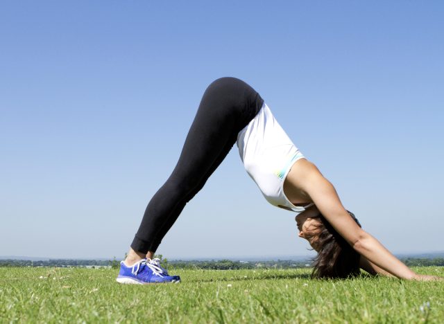 Woman demonstrating judo push-up exercise to lose belly fat