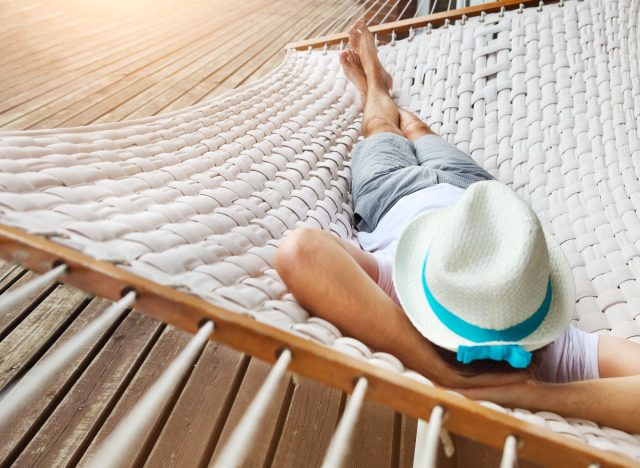 man napping in a hammock