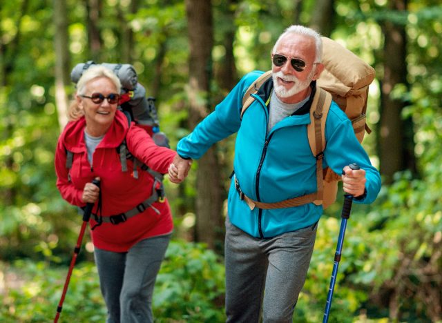 mature couple hiking, demonstrating how to regain muscle mass after 60