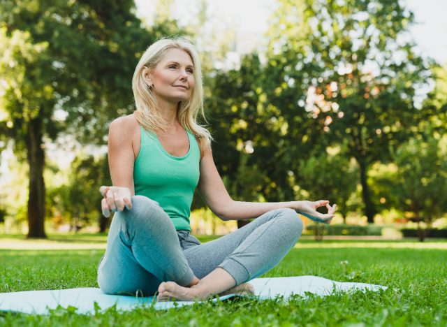 woman practicing breathing exercises to improve muscular endurance