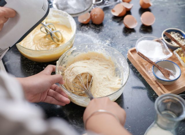 person mixing cake batter