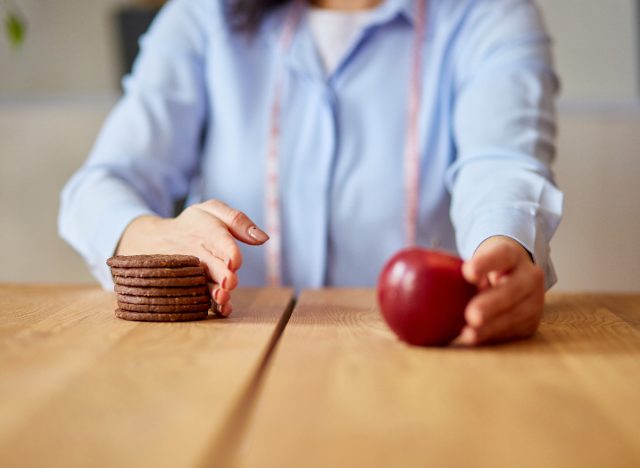 concept of saying no to cookies and sugar and yes to healthy food choices