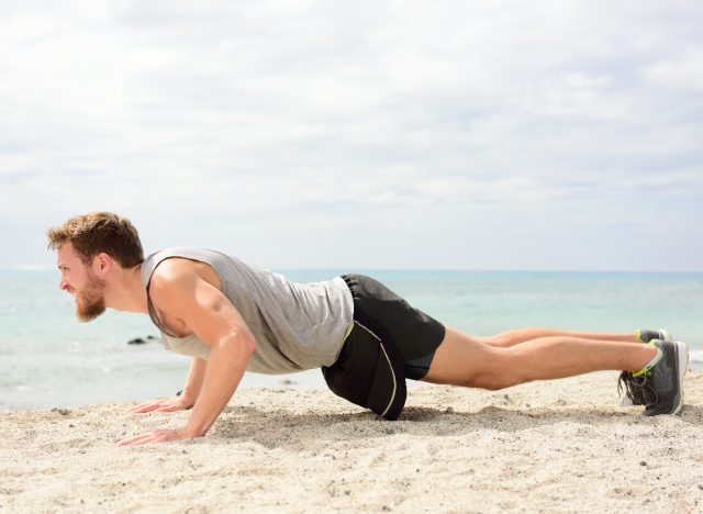 man performing tricep pushups