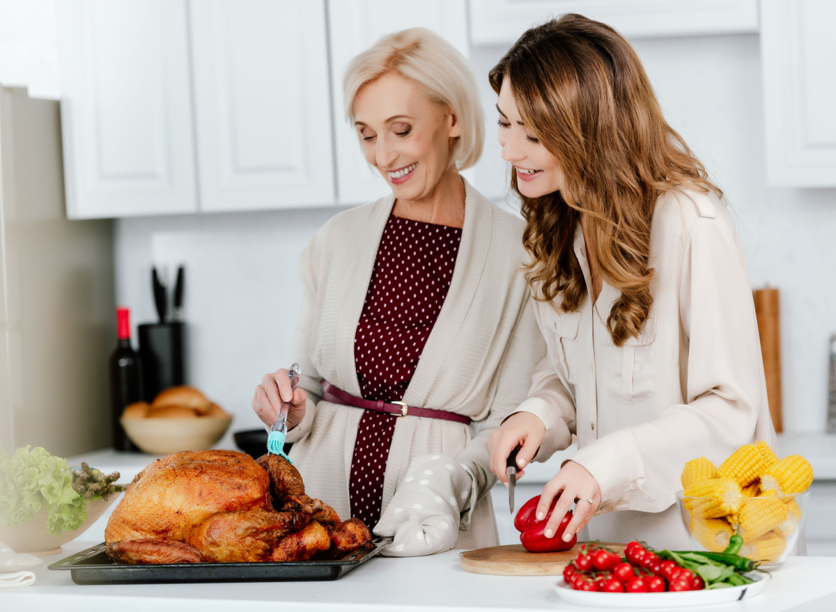 two women preparing thanksgiving dinner