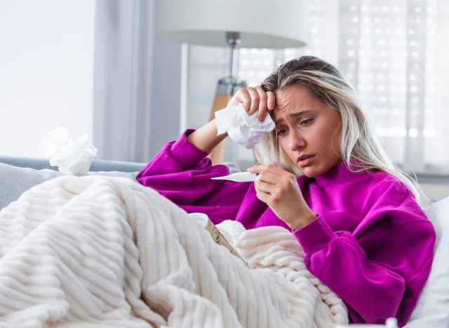 woman dealing with flu, virus at home, concept of how to keep your body healthy during flu season
