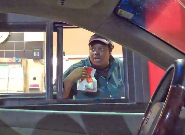 woman in drive thru shocked