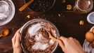 woman mixing ingredients for chocolate cake