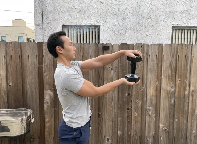 dumbbell bus drivers exercise for boulder shoulders