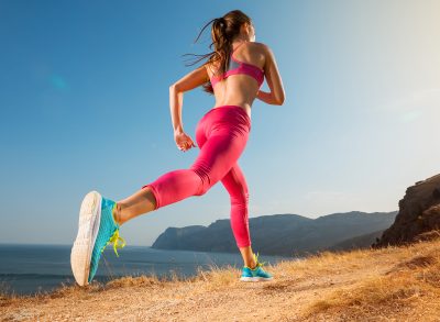 fit woman running outdoors, best running shoes concept
