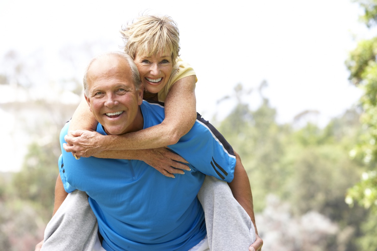 Senior,Couple,Exercising,In,Park