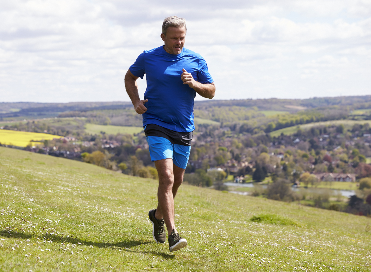 mature man jogging outdoors, demonstrating exercises men should avoid to regain muscle