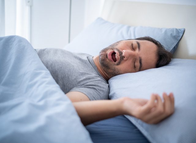 man snoring while sleeping