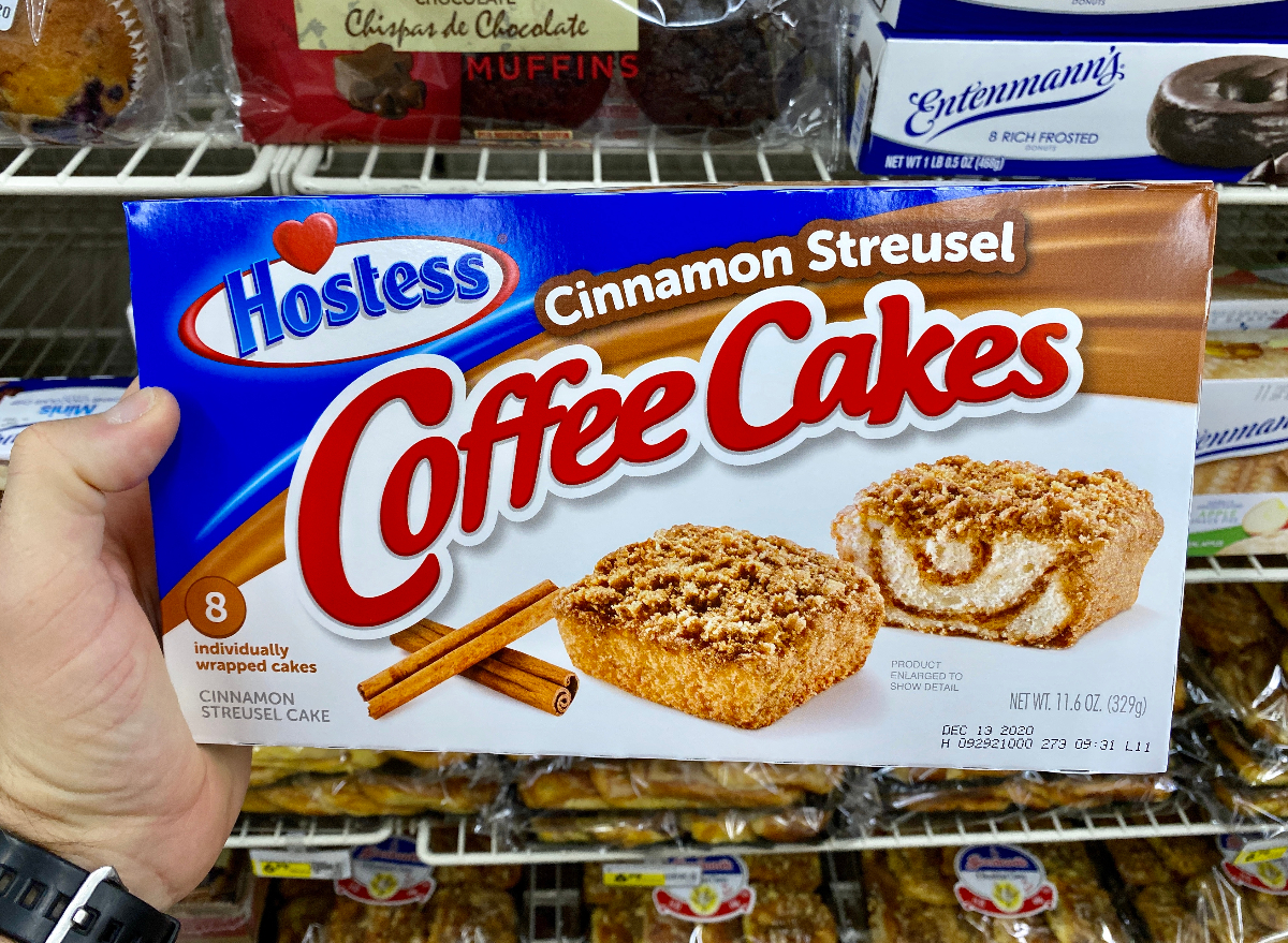 person holding hostess cinnamon streusel coffee cakes