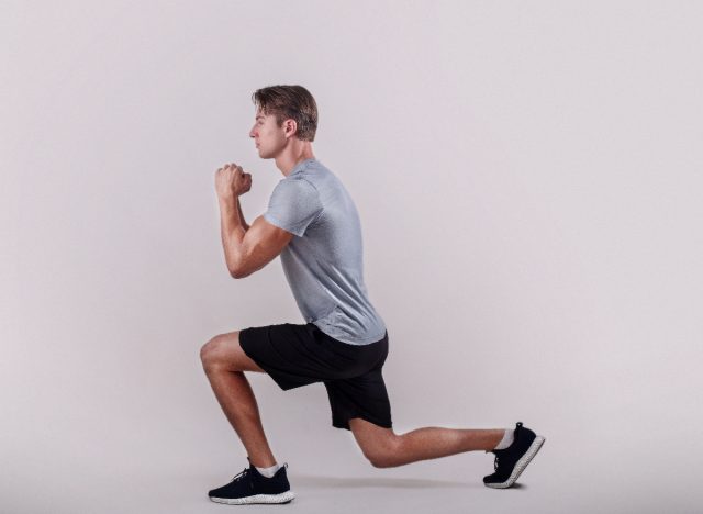 man demonstrating reverse lunges exercise to lose your large belly