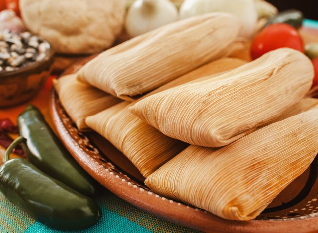 plate of tamales, worst holiday foods giving you a santa belly