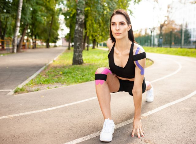 woman demonstrating deep lunge to get rid of balloon belly bloat