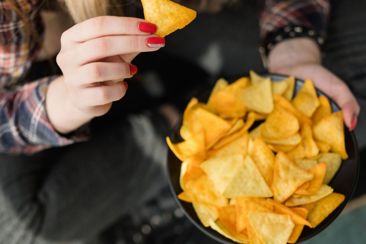 woman holding chips