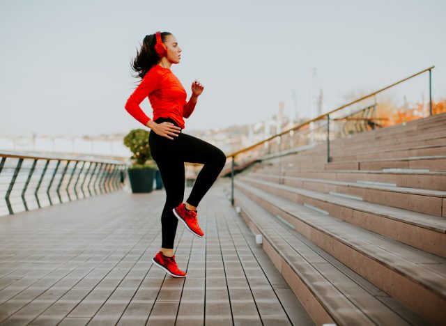 woman outdoors, concept of Christmas workout songs