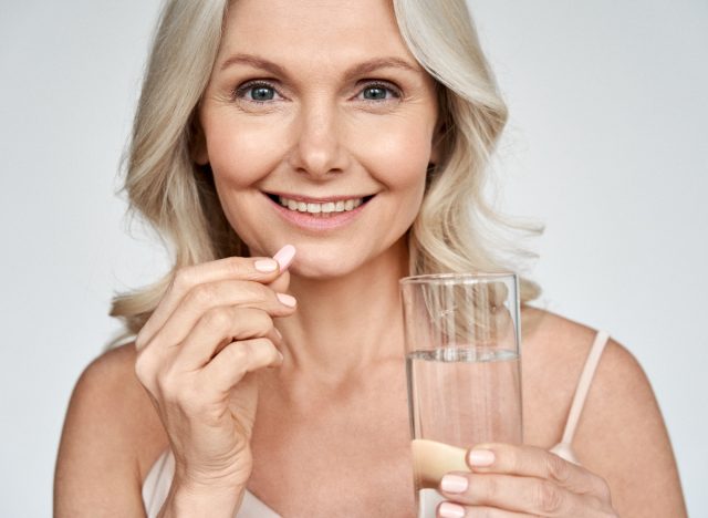 mature woman demonstrating how to increase stamina after 60 by taking supplements