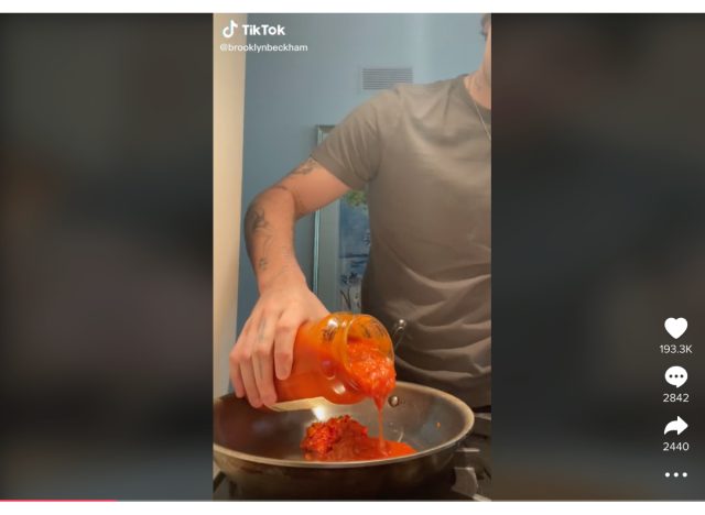 brooklyn beckham making spicy tomato pasta